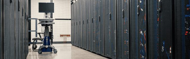 Tech data center with laptop. 